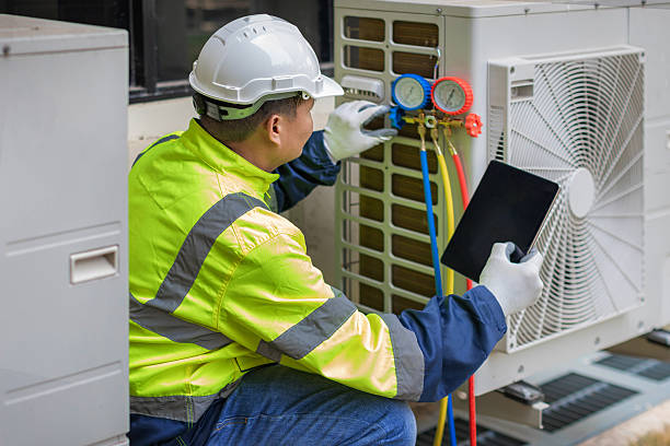 Professional Air Conditioning Repair technician working in Easton, MO